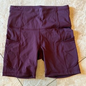 Lululemon biker shorts with pockets size 4 burgundy.